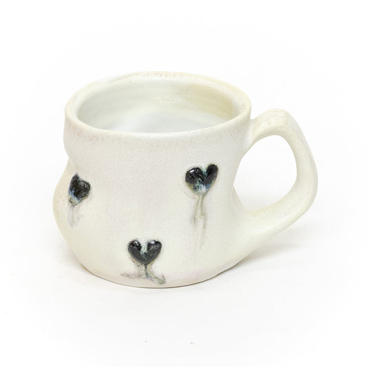 Black Hearts Mug by Liz Mazurek